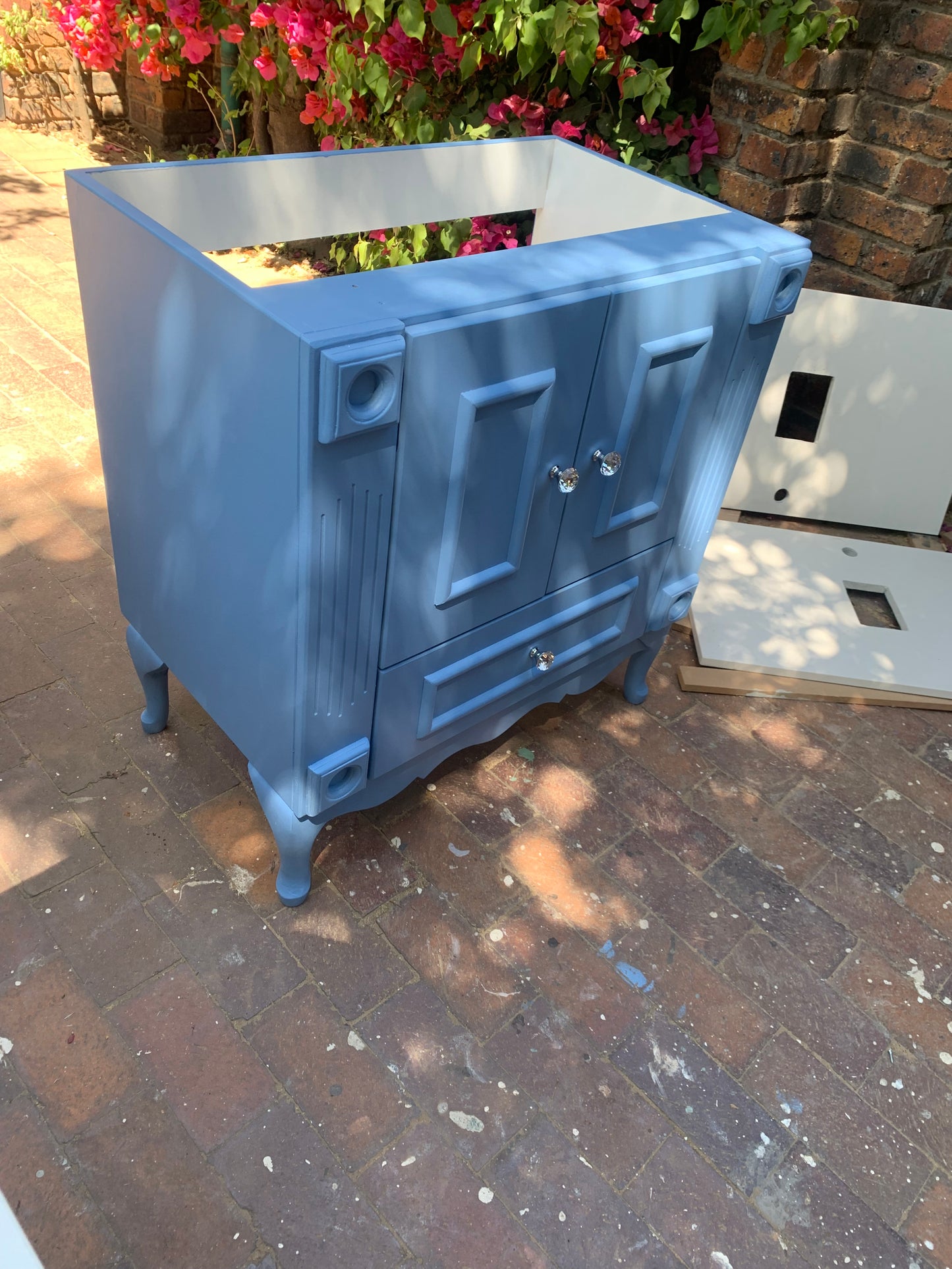 Single Vanity , Battleship blue , with crystal knob handles and choice of Quartz top.